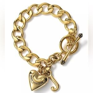Vintage never worn Juicy Couture gold charm bracelet